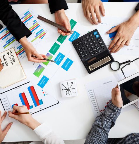 businessmen-hands-white-table-with-documents-drafts_176420-351